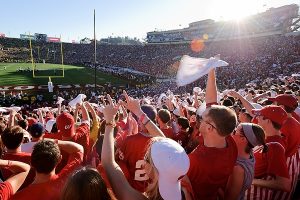 Badger fans cheer and wave rally towels during the 2012 Rose Bowl football game between the University of Wisconsin-Madison Badgers and the University of Oregon Ducks at the Rose Bowl Stadium in Pasadena, Calif., on Jan. 2, 2012. Wisconsin lost the game, 38-45. (Photo by Jeff Miller/UW-Madison)